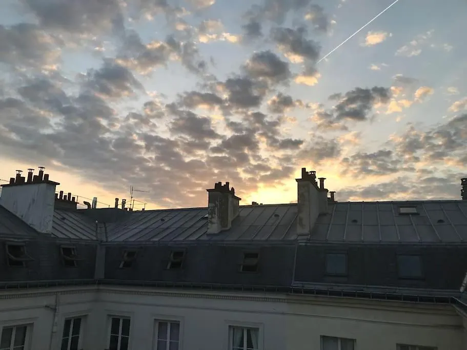 Charming Parisian Apartment Under The Rooftops